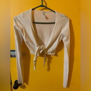 Cute off white Garage half sweater. Ties up in front. Vintage size small.